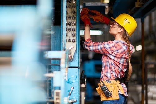 Female trades worker, technician.