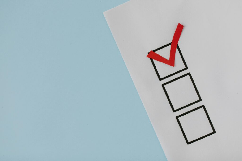 Red check mark in a box