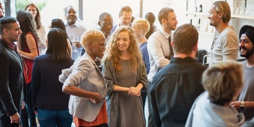 Crowd of people at job fair.
