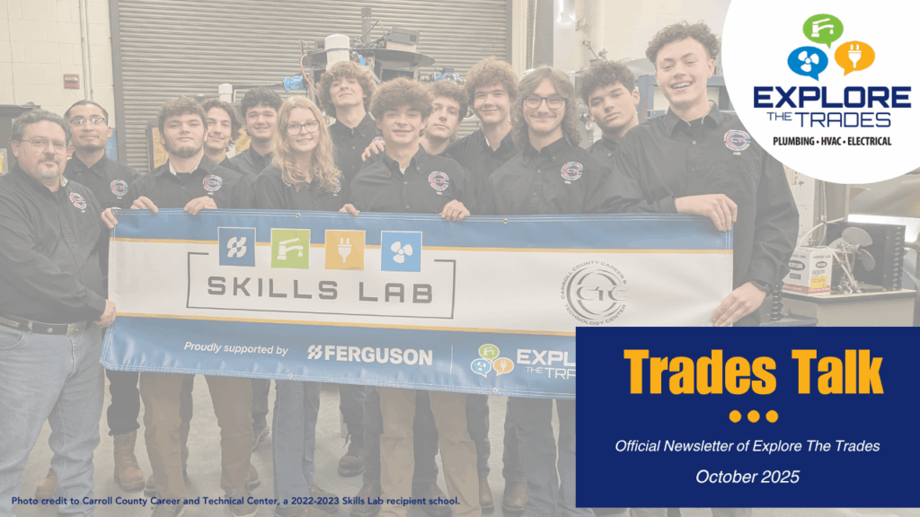 Students standing behind a banner.