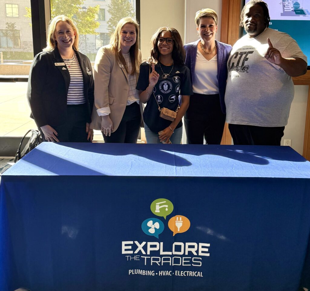 Explore the Trades company booth.