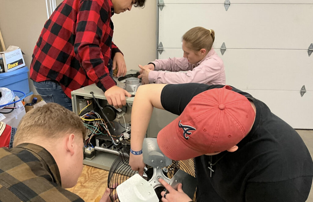 Explore the Trades Skills Lab students.